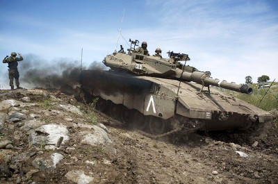 Avril 2013,  un char israélien en manœuvres dans le Golan près de la frontière  Syrienne Photo AFP_Menahem Kahana