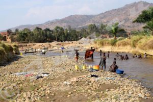 Lives exposed to Cholera: Riverside residents use contaminated water of Mugere River for different purposes, thus exposing their lives to the epidemic.
