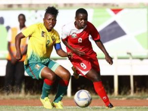 (Inset) Christine Mannie of cameroon (left) struggles for the ball with Neddy Atieno of Kenya harambee starlets at Safaricom stadium, Kasarani during a friendly match on Saturday 22nd October 2016. 