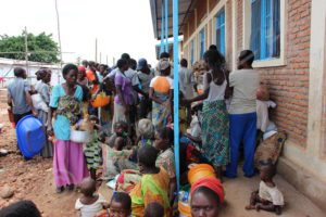 Congolese refugees receiving food assistance in Cishemere refugee transit site