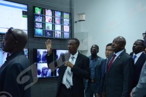 An expert explains to President Nkurunziza how digital television works