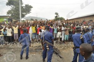 Protesters and police officers facing each other before the demonstrations of 2015 turned violent