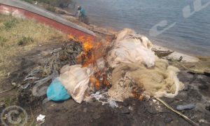 Some instruments which are not allowed to be used in fishing were burnt by the technical commission in charge of securing lake navigation