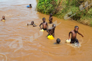 Kagwema inhabitants draw water from Rusizi River 