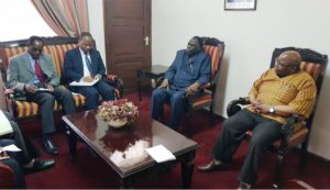 Facilitator in Burundi conflict William Mkapa receiving the UNSG Special Envoy, Michel Kafando 