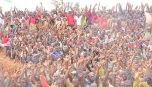 Supporters of CNDD-FDD party raised their hands while confirming that they will vote "yes".