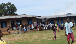 Voters queuing in front of polling stations in the center of Kibanguiste Church.