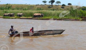 A boat crossing the Rusizi River towards Mparambo border