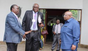 William Benjamin Mkapa, in consultation with members of his office